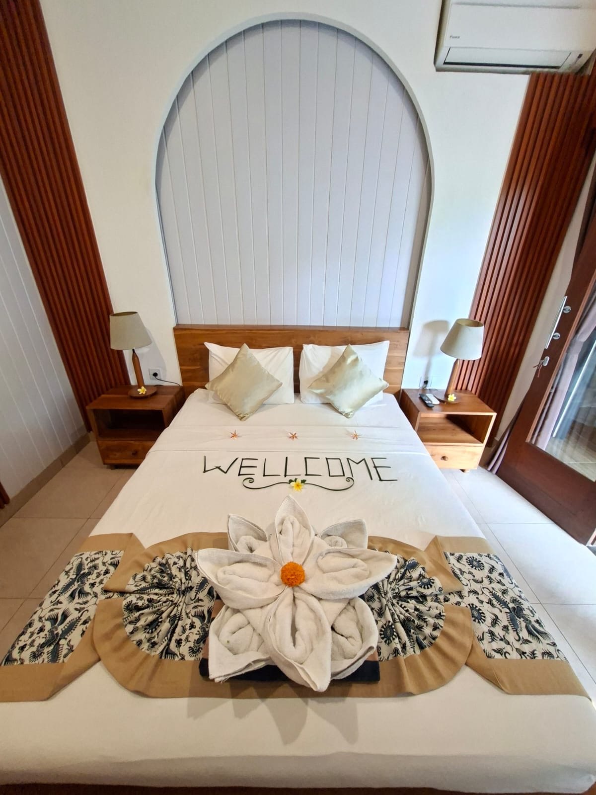 Villa Amaluku suite prepared with a floral towel welcome